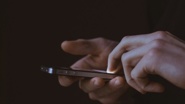 User tapping on phone